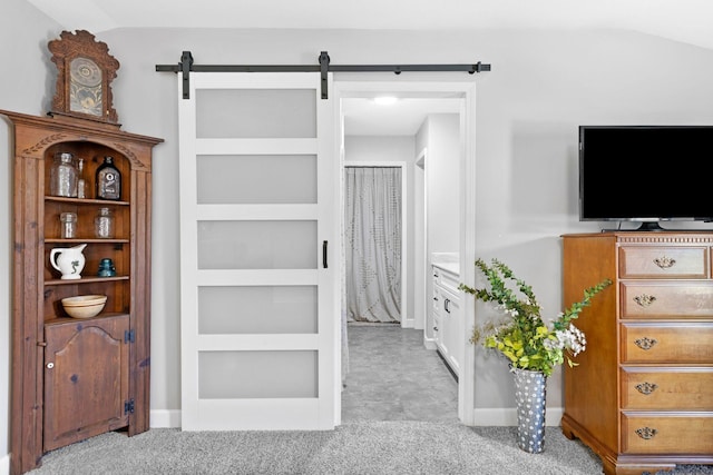516 Main St, Burns, TN 37029 - interior space featuring a barn door and baseboards