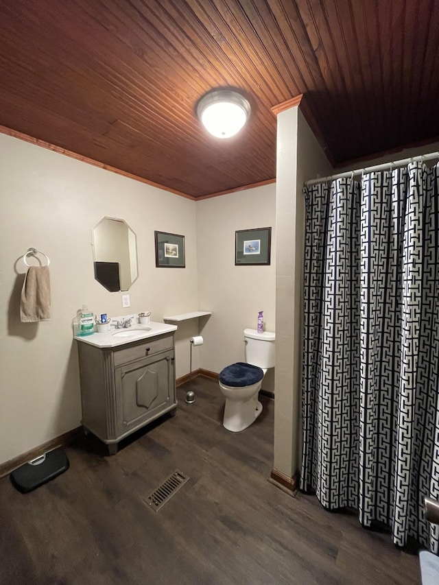 903 Days Rd, Lafayette, TN 37083 - bathroom with toilet, baseboards, vanity, wood finished floors, and wooden ceiling