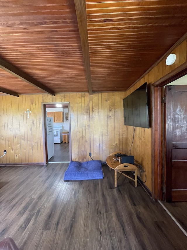 903 Days Rd, Lafayette, TN 37083 - spare room with wood ceiling with exposed beams, wood finished floors, wood walls, and washer / clothes dryer