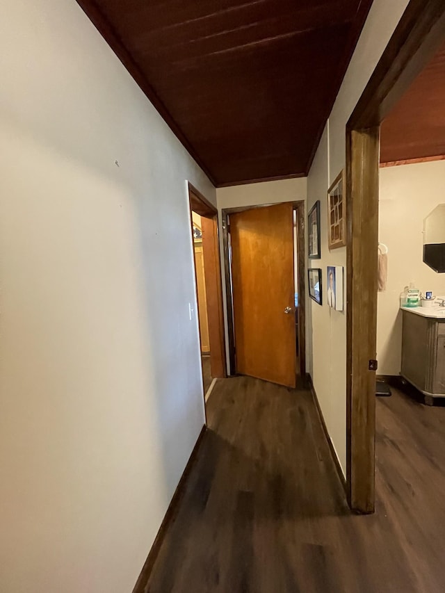 903 Days Rd, Lafayette, TN 37083 - corridor with wood finished floors, baseboards, and ornamental molding
