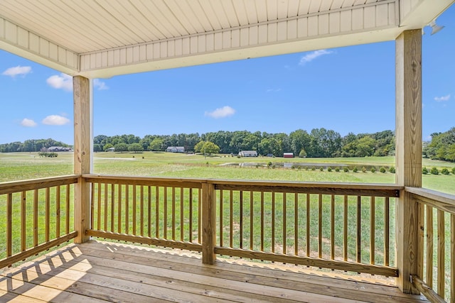 43 Long Branch Rd, Lawrenceburg, TN 38464 - wooden terrace featuring a rural view, view of wooded area, and a yard