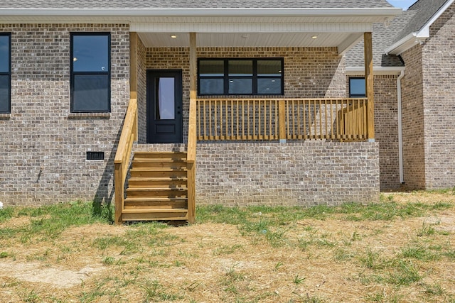 47 Long Branch Rd, Lawrenceburg, TN 38464 - view of exterior entry with brick siding and roof with shingles