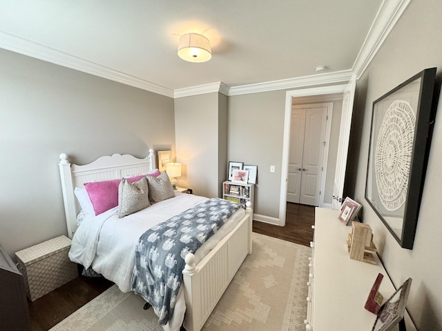 82 Addison Ave, Franklin, TN 37064 - bedroom featuring ornamental molding, light wood-type flooring, and baseboards