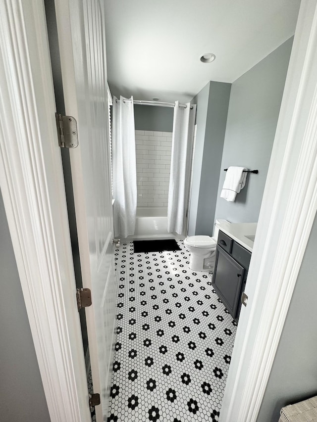 82 Addison Ave, Franklin, TN 37064 - bathroom with toilet, vanity, shower / bath combination with curtain, and tile patterned floors