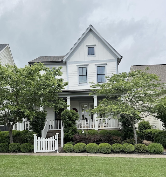 82 Addison Ave, Franklin, TN 37064 - view of front of property with board and batten siding and a porch