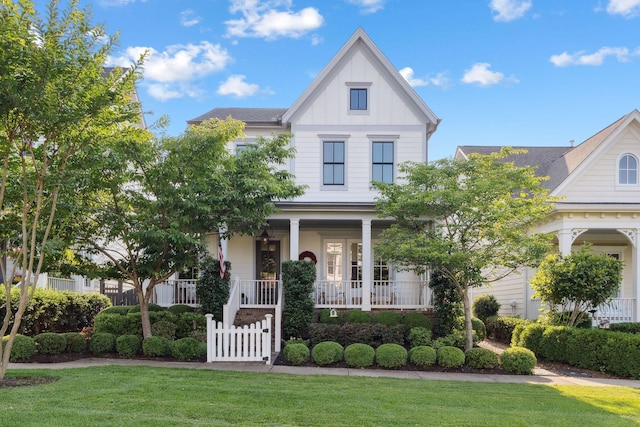 82 Addison Ave, Franklin, TN 37064 - victorian home with a porch, board and batten siding, and a front lawn