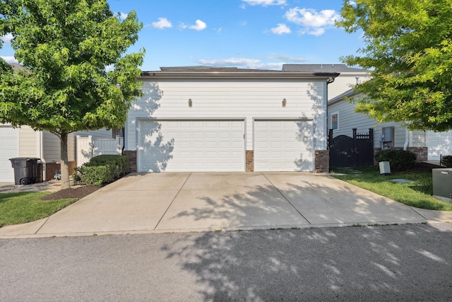 82 Addison Ave, Franklin, TN 37064 - view of front facade with brick siding and concrete driveway