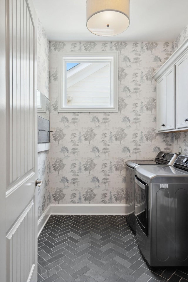 82 Addison Ave, Franklin, TN 37064 - washroom featuring separate washer and dryer, cabinet space, wallpapered walls, and brick patterned flooring