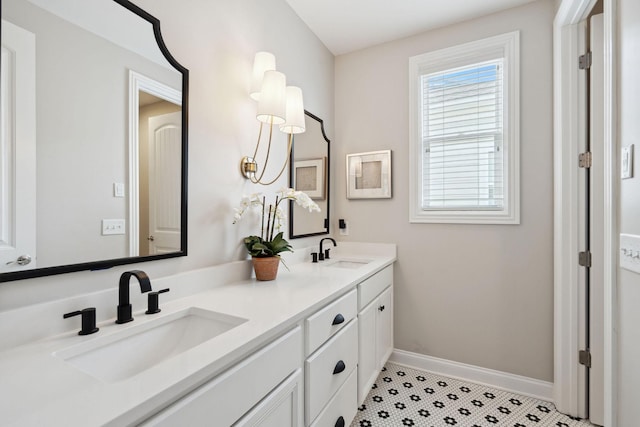 82 Addison Ave, Franklin, TN 37064 - full bathroom with double vanity and baseboards