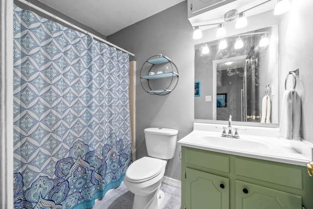 517 Ginkgo Dr, Clarksville, TN 37042 - full bathroom featuring toilet, vanity, and a shower with curtain