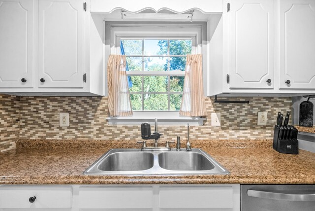 517 Ginkgo Dr, Clarksville, TN 37042 - kitchen with a sink, white cabinetry, backsplash, and stainless steel dishwasher