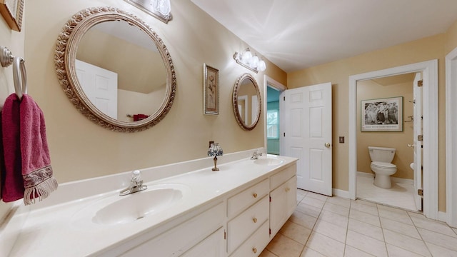 103 Doral Ln, Hendersonville, TN 37075 - bathroom with double vanity, tile patterned floors, toilet, and baseboards