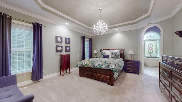 103 Doral Ln, Hendersonville, TN 37075 - bedroom with a raised ceiling, a chandelier, light colored carpet, baseboards, and arched walkways