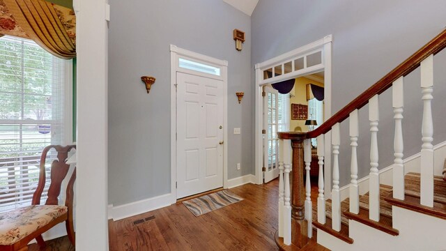 103 Doral Ln, Hendersonville, TN 37075 - entryway with wood finished floors, healthy amount of natural light, baseboards, stairs, and a high ceiling