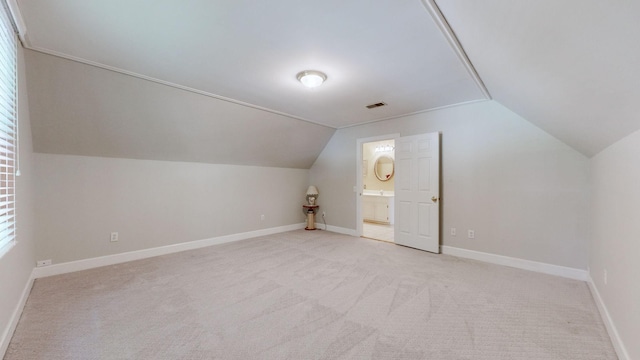103 Doral Ln, Hendersonville, TN 37075 - additional living space featuring vaulted ceiling, light carpet, and baseboards