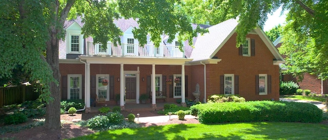 103 Doral Ln, Hendersonville, TN 37075 - back of property featuring covered porch, a lawn, and brick siding