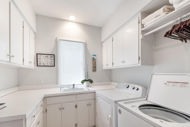 143 Prospect Hl, Nashville, TN 37205 - laundry area featuring washing machine and clothes dryer, cabinet space, and recessed lighting