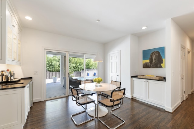 143 Prospect Hl, Nashville, TN 37205 - dining area with dark wood-style floors, baseboards, and recessed lighting