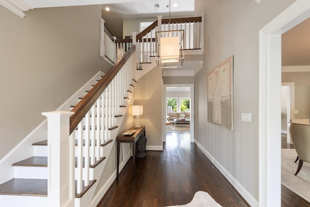 143 Prospect Hl, Nashville, TN 37205 - staircase featuring wood finished floors, baseboards, recessed lighting, crown molding, and a high ceiling