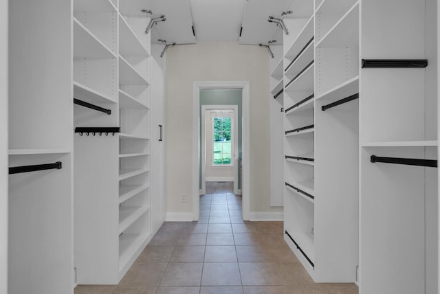 3840 SE Tater Peeler Rd, Lebanon, TN 37090 - walk in closet featuring light tile patterned flooring