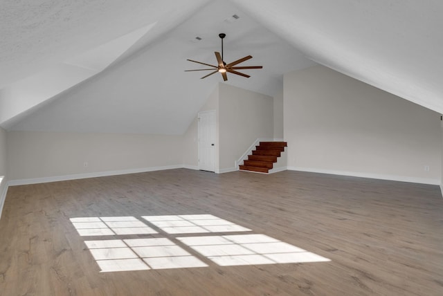 3840 SE Tater Peeler Rd, Lebanon, TN 37090 - bonus room featuring vaulted ceiling, wood finished floors, stairway, a ceiling fan, and baseboards