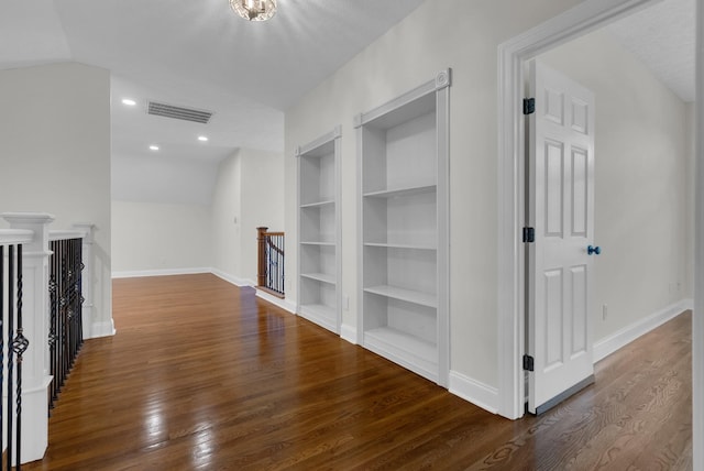 3840 SE Tater Peeler Rd, Lebanon, TN 37090 - unfurnished living room featuring built in features, baseboards, wood finished floors, and vaulted ceiling