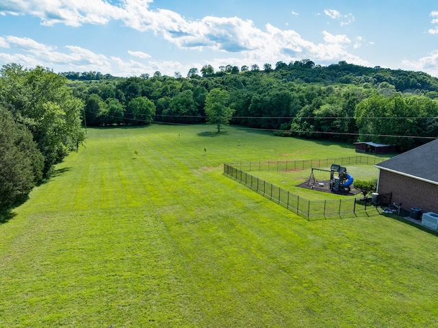 3840 SE Tater Peeler Rd, Lebanon, TN 37090 - view of yard featuring a wooded view