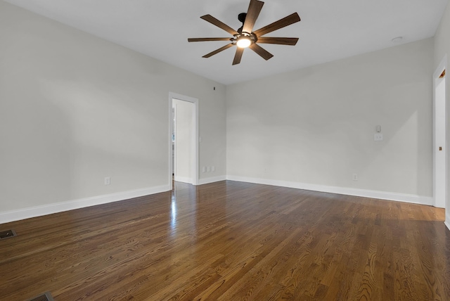 3840 SE Tater Peeler Rd, Lebanon, TN 37090 - empty room featuring a ceiling fan, dark wood-style flooring, and baseboards
