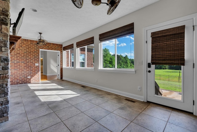 3840 SE Tater Peeler Rd, Lebanon, TN 37090 - unfurnished sunroom with plenty of natural light