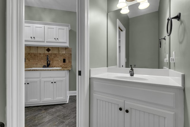 3840 SE Tater Peeler Rd, Lebanon, TN 37090 - bathroom featuring vanity and decorative backsplash