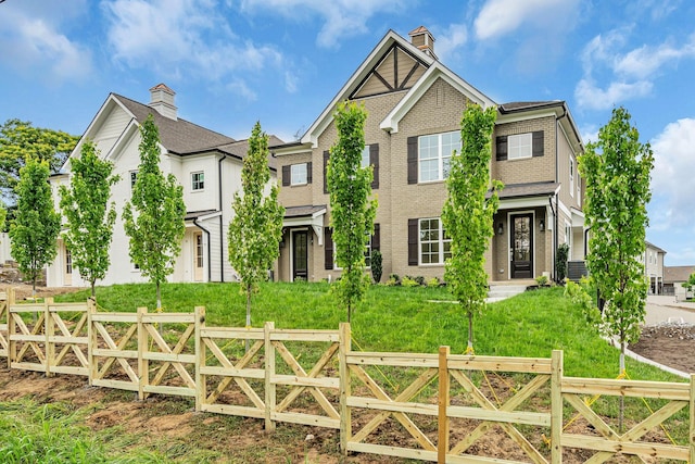 730 Old Hickory Blvd Unit 224, Nashville, TN 37209 - view of front of property with a gate, a chimney, and brick siding