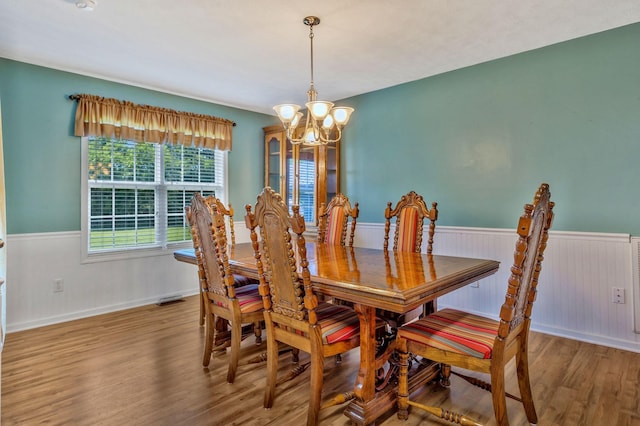 2137 Horton Way, Lewisburg, TN 37091 - dining room with wood finished floors, wainscoting, a chandelier, and baseboards