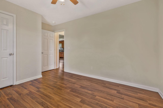 2137 Horton Way, Lewisburg, TN 37091 - unfurnished bedroom featuring baseboards, wood finished floors, and ceiling fan