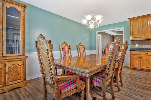 2137 Horton Way, Lewisburg, TN 37091 - dining area with a chandelier, wood finished floors, and wainscoting