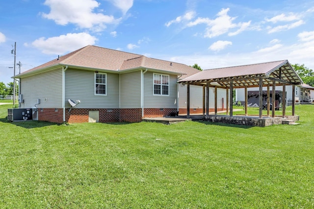 2137 Horton Way, Lewisburg, TN 37091 - back of house featuring a gazebo, central AC unit, a yard, a shingled roof, and crawl space