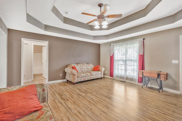 2137 Horton Way, Lewisburg, TN 37091 - sitting room featuring a raised ceiling, baseboards, a ceiling fan, and wood finished floors