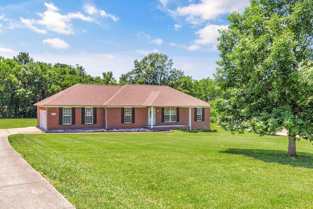 2137 Horton Way, Lewisburg, TN 37091 - ranch-style home featuring driveway, a front lawn, an attached garage, and brick siding