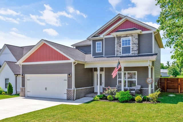 1114 Johnson St, Burns, TN 37029 - craftsman house featuring a porch, an attached garage, stone siding, and driveway