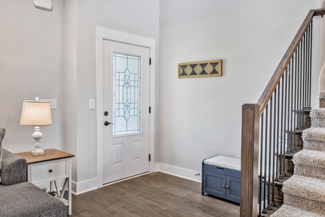 1114 Johnson St, Burns, TN 37029 - foyer with baseboards, stairway, and dark wood-style flooring