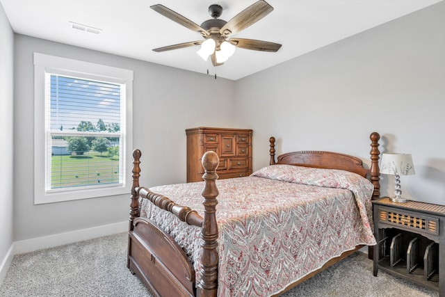 1114 Johnson St, Burns, TN 37029 - bedroom with carpet floors, baseboards, and ceiling fan
