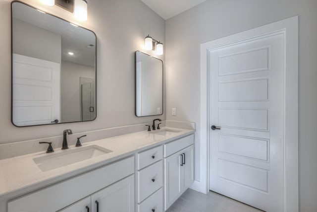 9067 Headwaters Dr Unit 141, Franklin, TN 37064 - full bathroom with double vanity, tile patterned flooring, and a shower