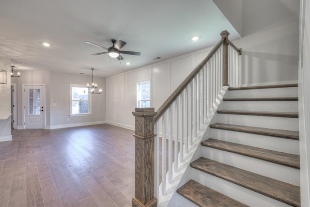 9067 Headwaters Dr Unit 141, Franklin, TN 37064 - stairs with a chandelier, wood finished floors, ceiling fan, baseboards, and recessed lighting