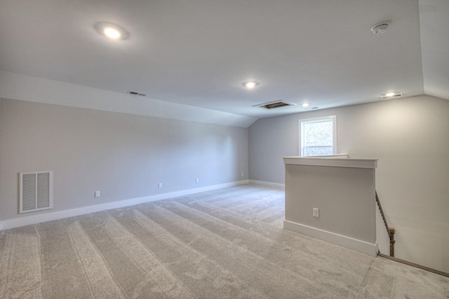 9067 Headwaters Dr Unit 141, Franklin, TN 37064 - spare room featuring vaulted ceiling, baseboards, light carpet, a smoke detector, and recessed lighting