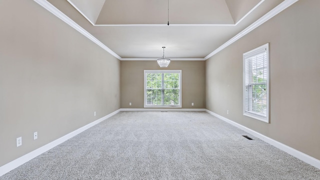 1023 Fitzroy Cir, Spring Hill, TN 37174 - empty room featuring a chandelier, light carpet, and crown molding