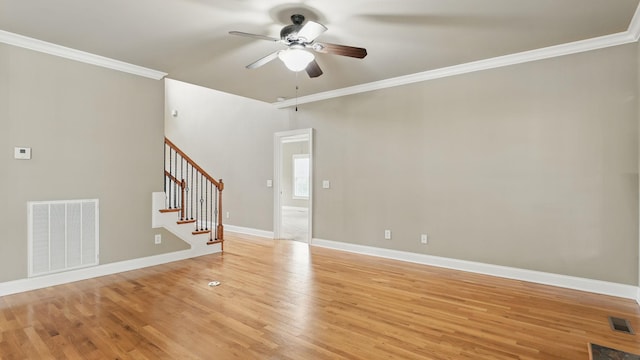 1023 Fitzroy Cir, Spring Hill, TN 37174 - unfurnished living room featuring ceiling fan, light wood finished floors, crown molding, and stairway