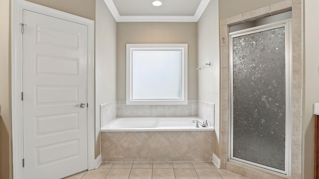 1023 Fitzroy Cir, Spring Hill, TN 37174 - full bathroom featuring tile patterned flooring, a shower stall, a garden tub, and ornamental molding