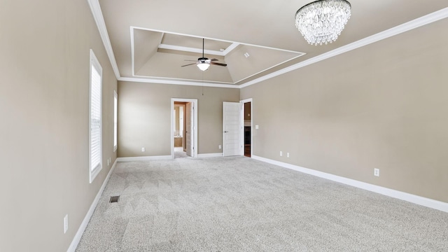 1023 Fitzroy Cir, Spring Hill, TN 37174 - spare room featuring a raised ceiling, plenty of natural light, a ceiling fan, ornamental molding, and carpet flooring