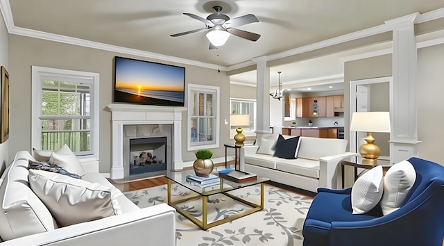 1023 Fitzroy Cir, Spring Hill, TN 37174 - living room featuring wood finished floors, a high end fireplace, ornamental molding, and a ceiling fan
