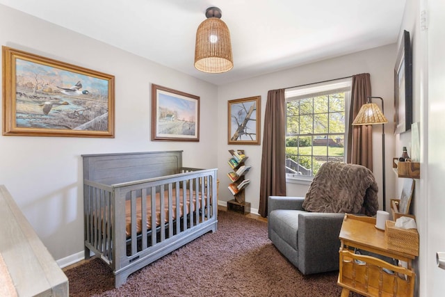 915 Tulip Cir, Gallatin, TN 37066 - carpeted bedroom featuring baseboards and a crib
