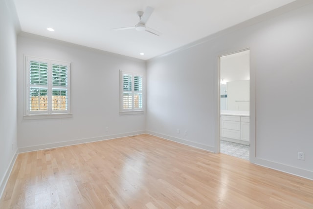 674B Westboro Dr, Nashville, TN 37209 - empty room featuring healthy amount of natural light, light wood-type flooring, a ceiling fan, baseboards, and recessed lighting